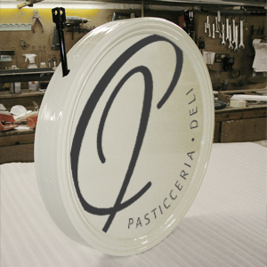 Vinyl graphics applied to circular shop sign